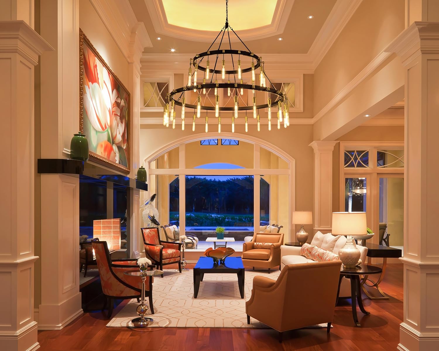TOCHIC Black Gold Chandelier Review: Our Honest Verdict 4 TOCHIC chandelier review honest opinion — Edison bulbs installed and illuminated in dining room setting